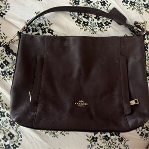 Coach purse. Crossbody or handle.
